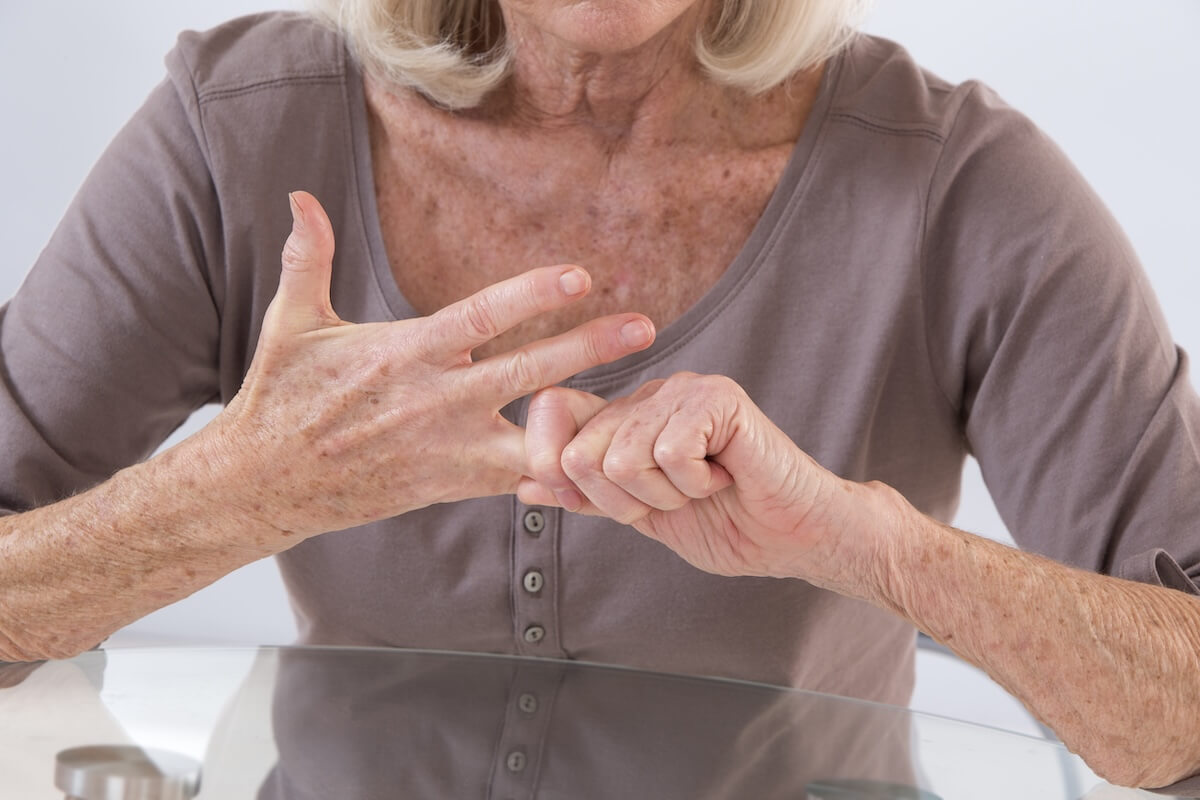 Older woman stretching her fingers