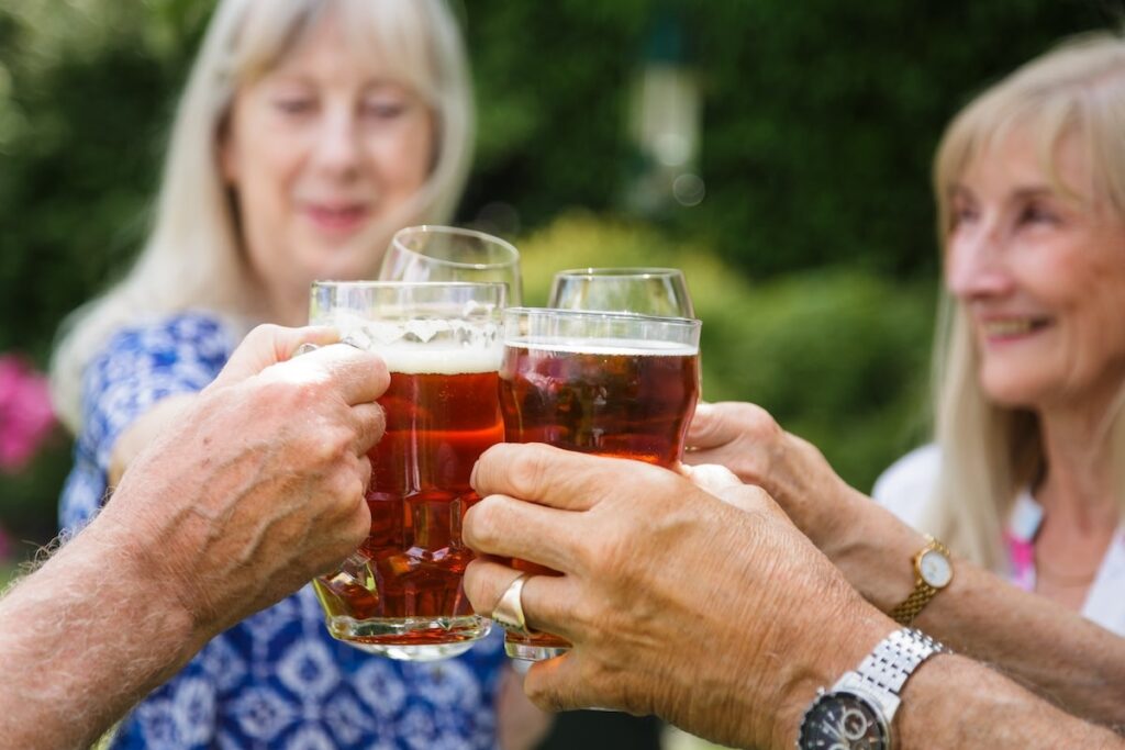 seniors enjoy beer at Oktoberfest