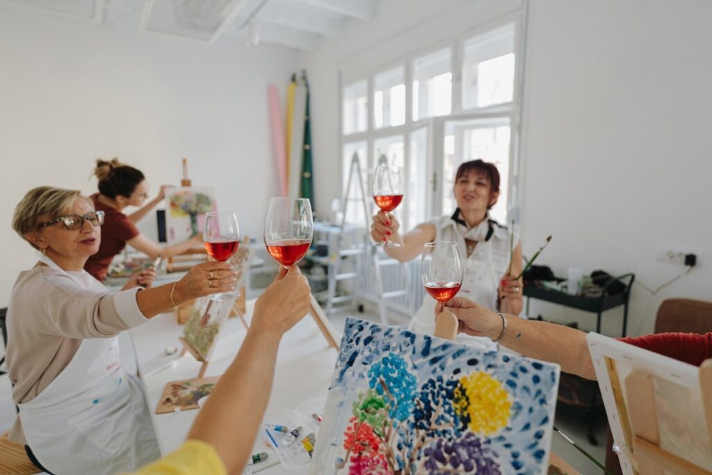 seniors enjoy painting wine party