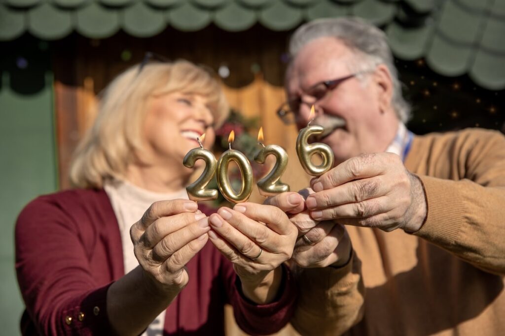 seniors hold up 2026 candles
